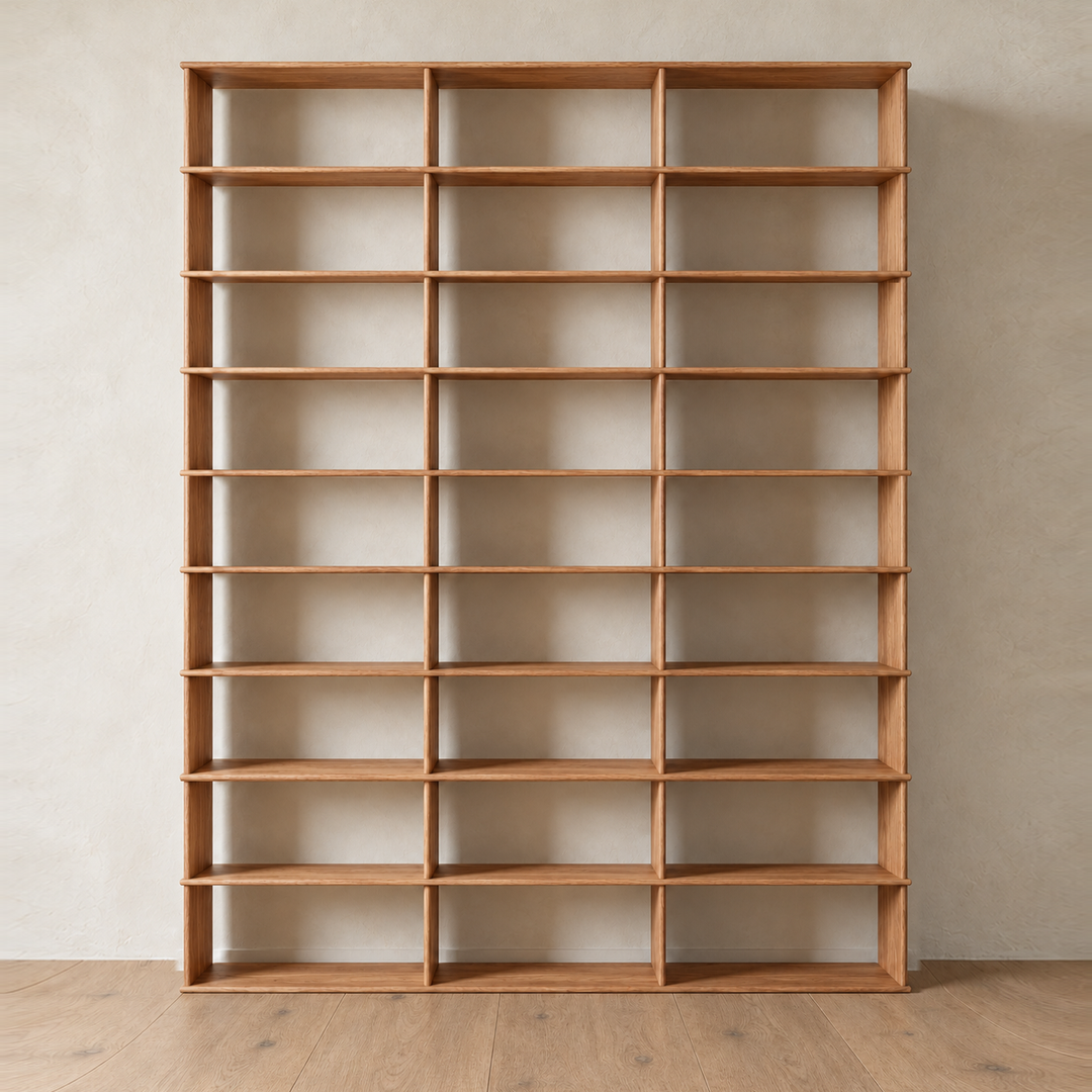 Front view of the empty 10 foot tall bookcase in red oak, 3 columns wide.
