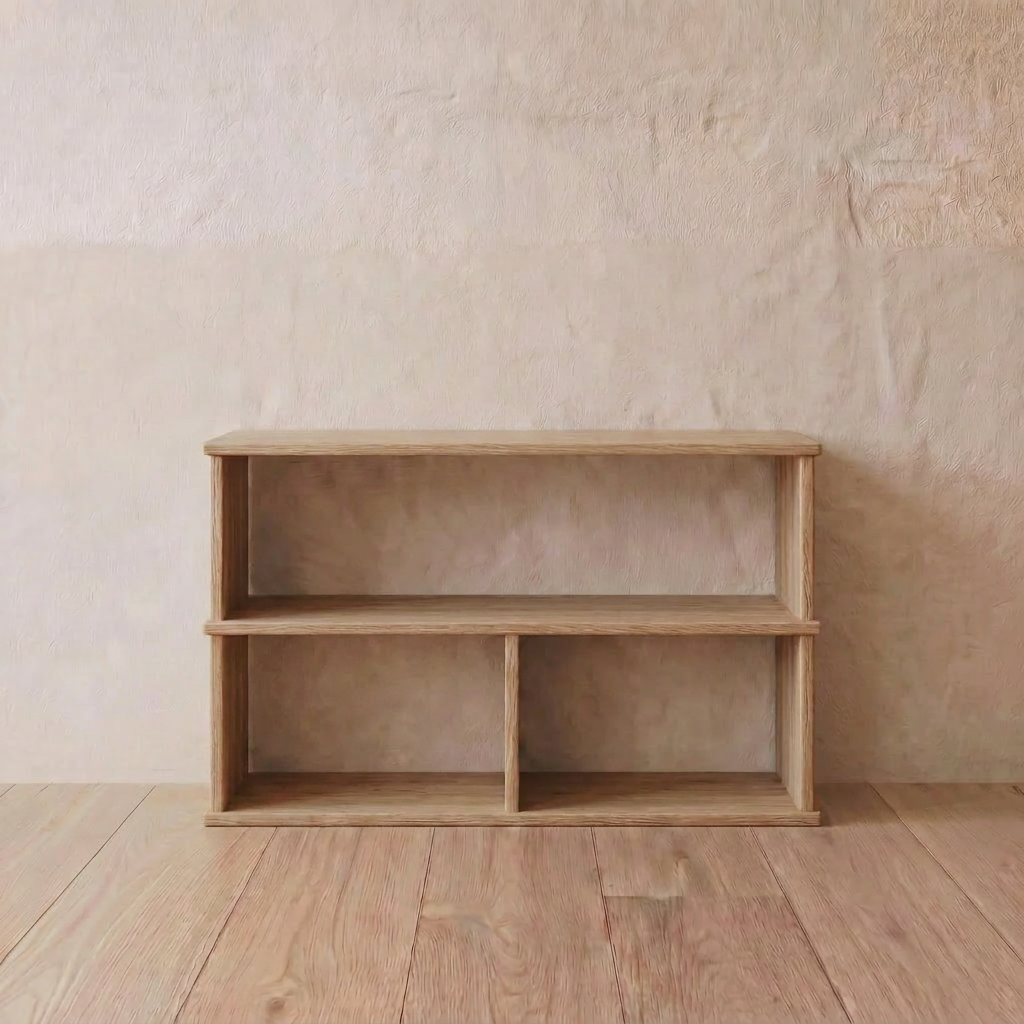 The 40 inch bookshelf TV stand in white oak features two levels and three compartments, offering a minimalist, functional design. It sits on a wooden floor against a beige textured wall, blending simplicity with modern style.