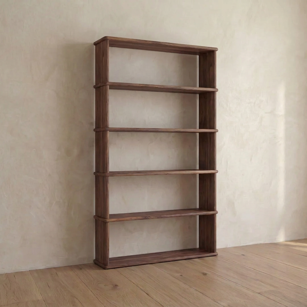 A minimalist Vancouver furniture setting features a tall, empty 5 shelf bookcase in walnut standing against a light-colored wall on a wooden floor.