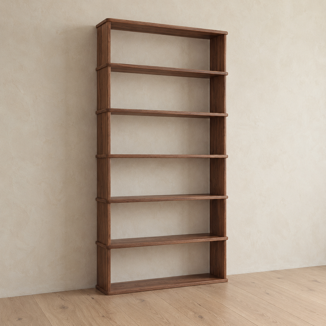 The empty 6 shelf bookcase in walnut from an angle, showing the solid sides and the depth of the shelves.