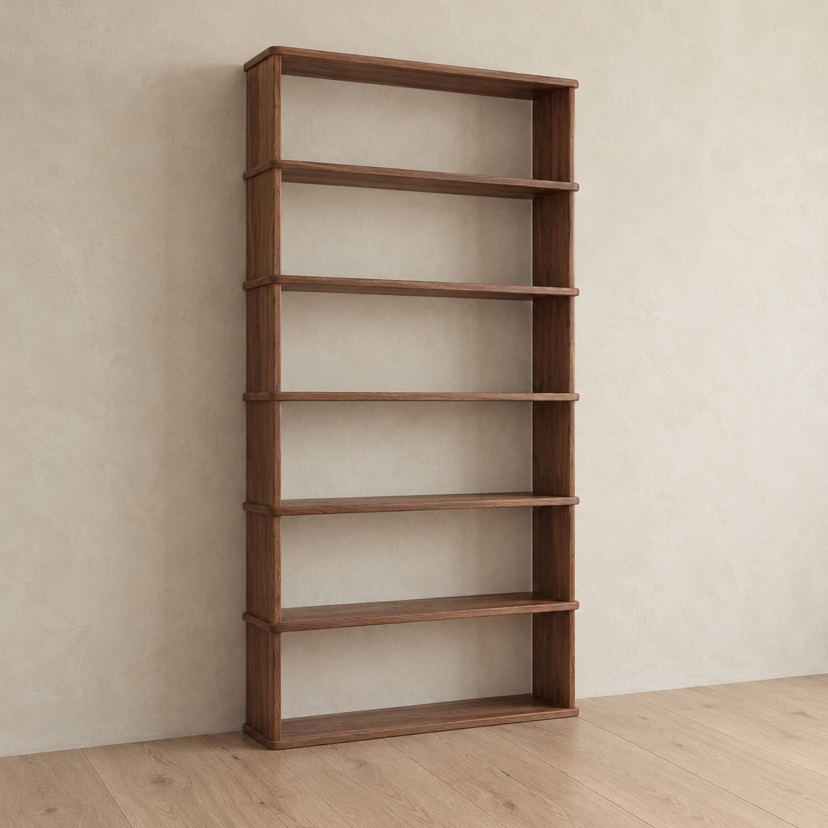 The empty 6 shelf bookcase in walnut from an angle, showing the solid sides and the depth of the shelves.
