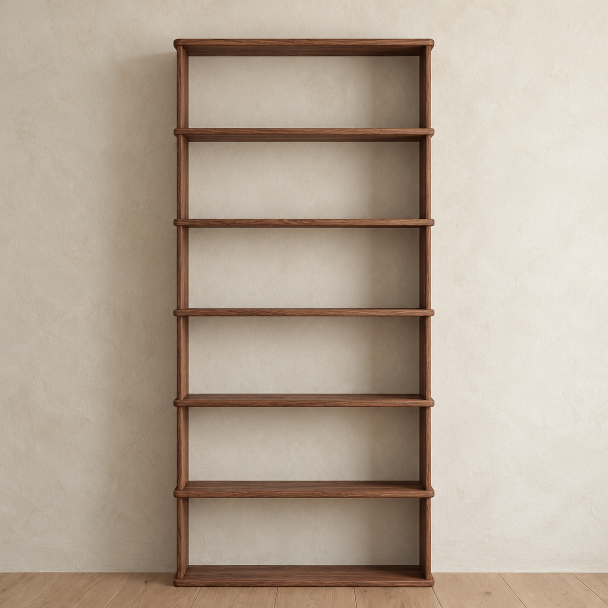 Front view of the empty 6 shelf bookcase in walnut, showing its open shelves, rounded shelf edges and solid sides.