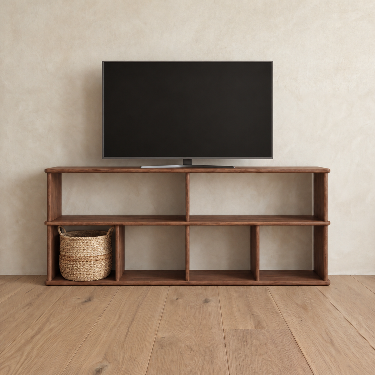 The 65 inch bookshelf TV stand in walnut holding a flat-screen TV, with a woven basket in one of the lower compartments.