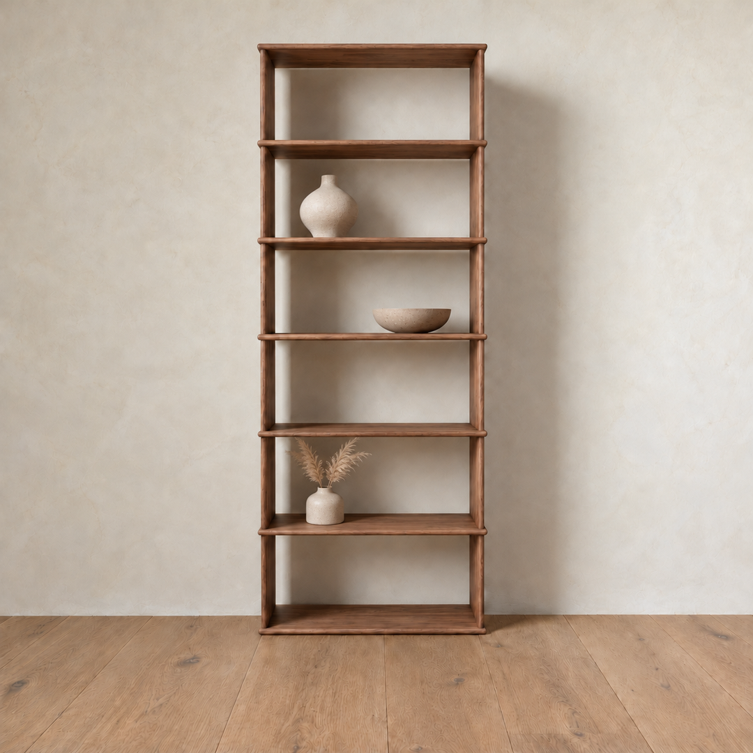 The 1 column 7 foot tall bookcase in walnut styled with a ceramic vase, a bowl and dried grass.