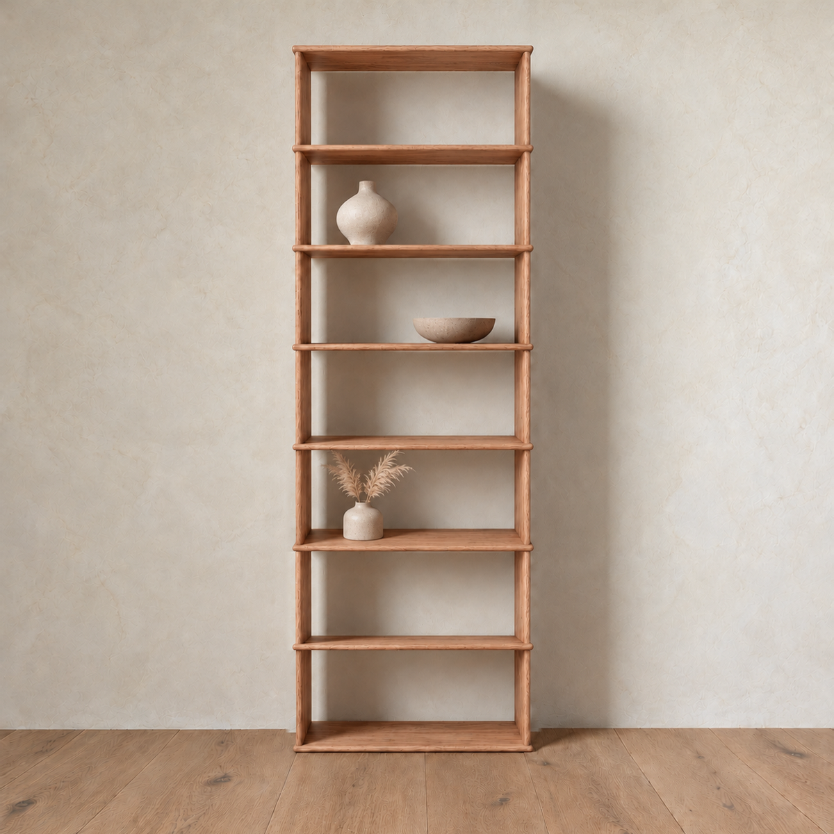 The 1 column 8 foot tall bookcase in red oak styled with a ceramic vase, a bowl and dried grass.