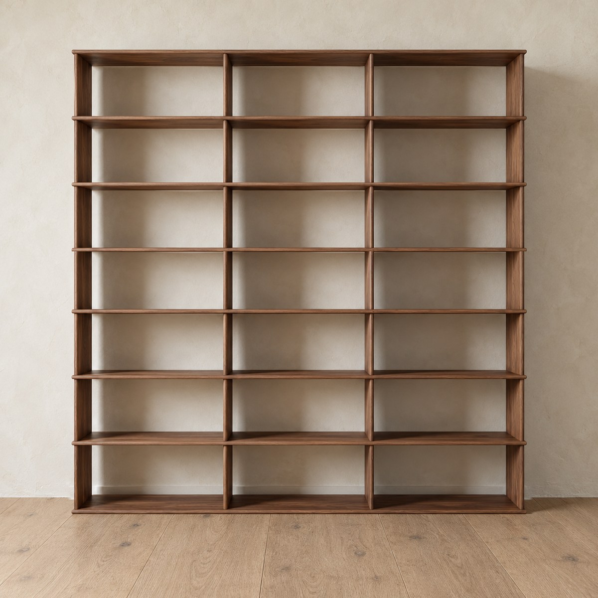 Front view of the empty 8 foot tall bookcase in walnut, 3 columns wide.