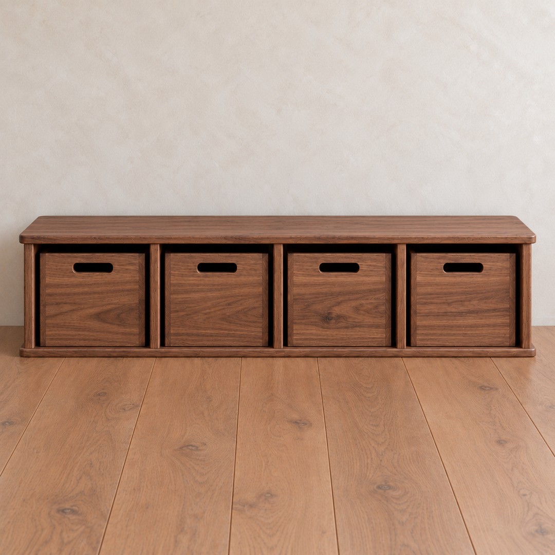 Entryway cubby bench in red oak featuring four open cubbies, each containing a matching storage bin with a cutout handle.