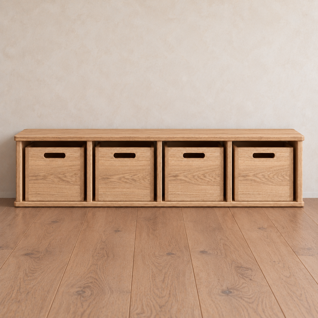 Entryway cubby bench in red oak featuring four open cubbies, each containing a matching square storage box.