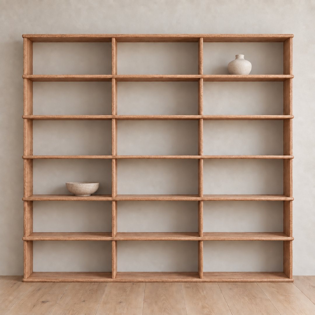 Full wall bookcase in red oak — with decor