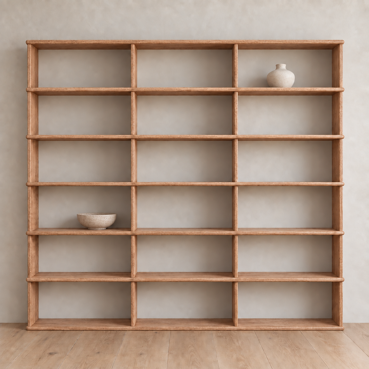 Full wall bookcase in red oak — with decor