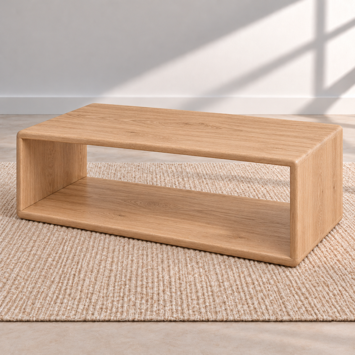 Angled view of the Japandi coffee table in white oak, showing its solid sides, rounded corners and the open shelf running underneath the top.