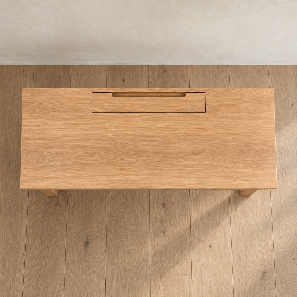 Minimalist office desk in white oak — top view