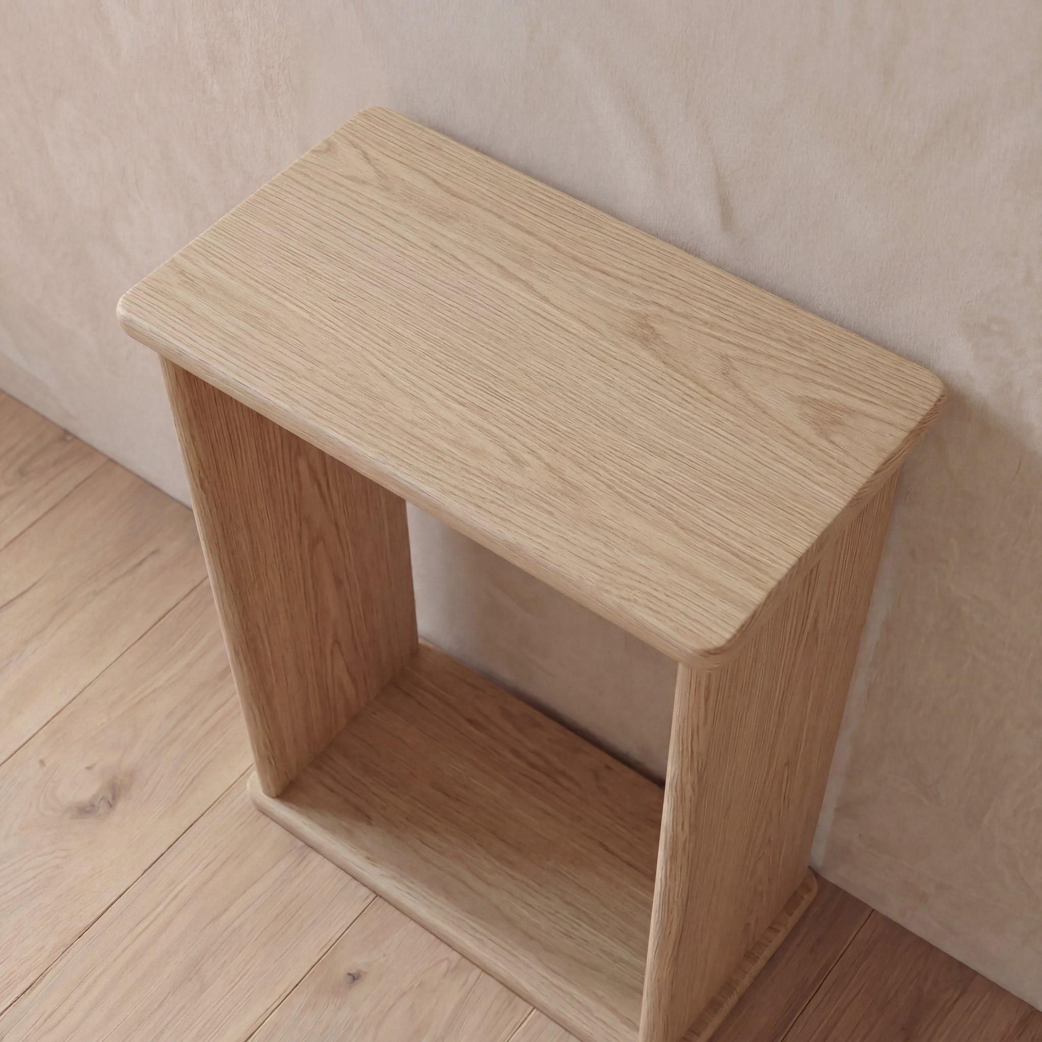 Top view of minimalist white oak side table