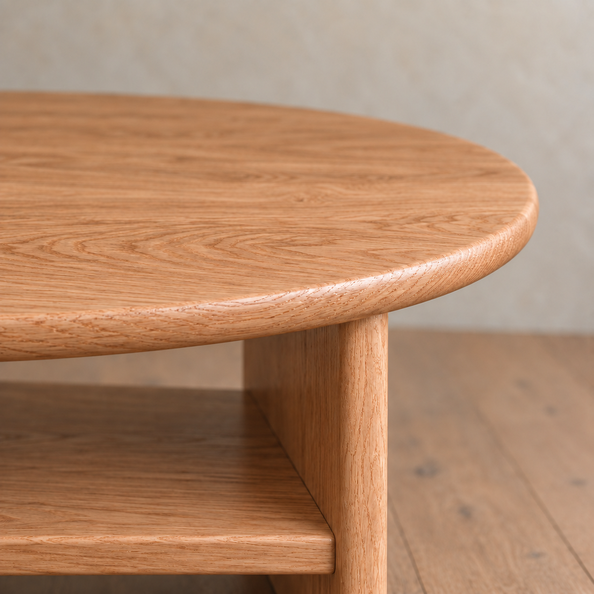 Round coffee table with shelf in red oak — edge detail