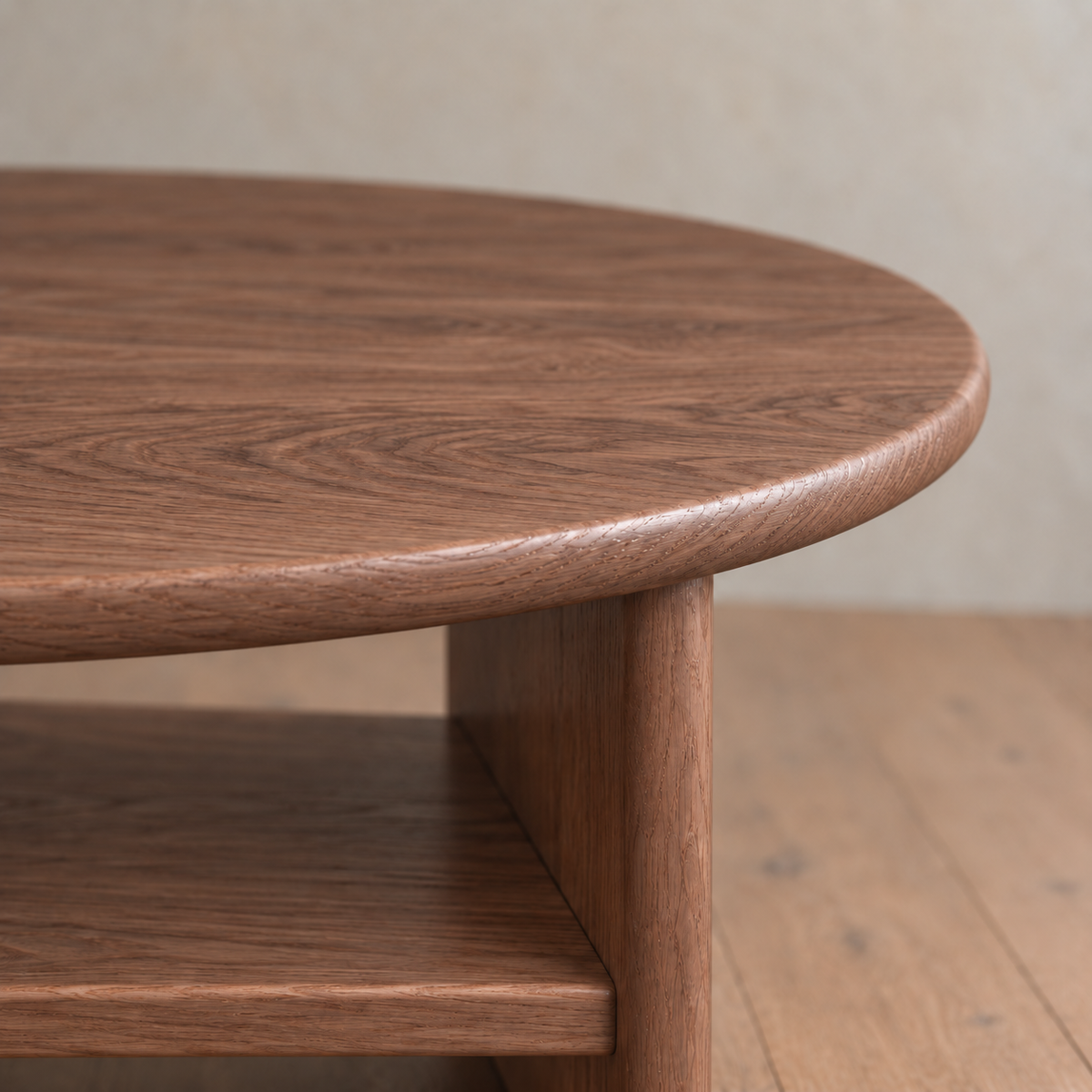 Round coffee table with shelf in walnut — edge detail