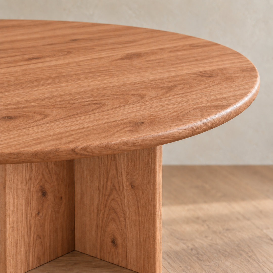 Round dining table in red oak — edge detail