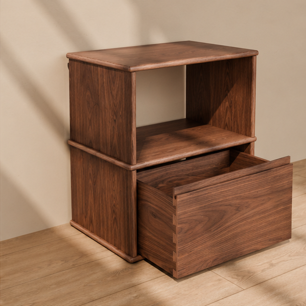 The solid wood nightstand in walnut with its drawer pulled open, showing the dovetailed drawer box.