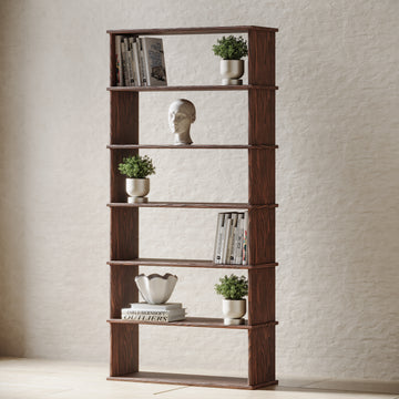 A tall walnut bookcase