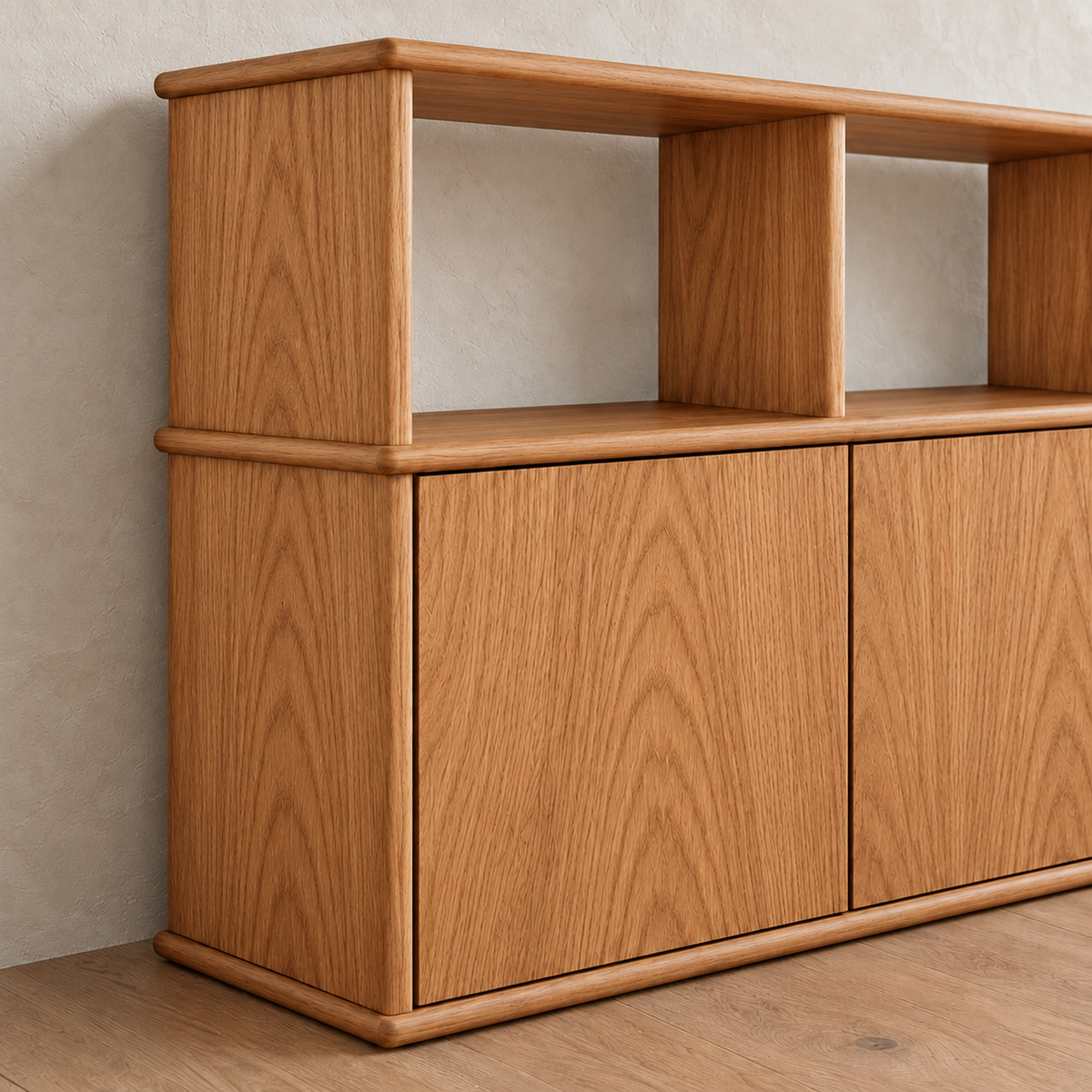 Close-up of a corner of the three door sideboard in red oak, showing the rounded edges of the top and middle shelf.