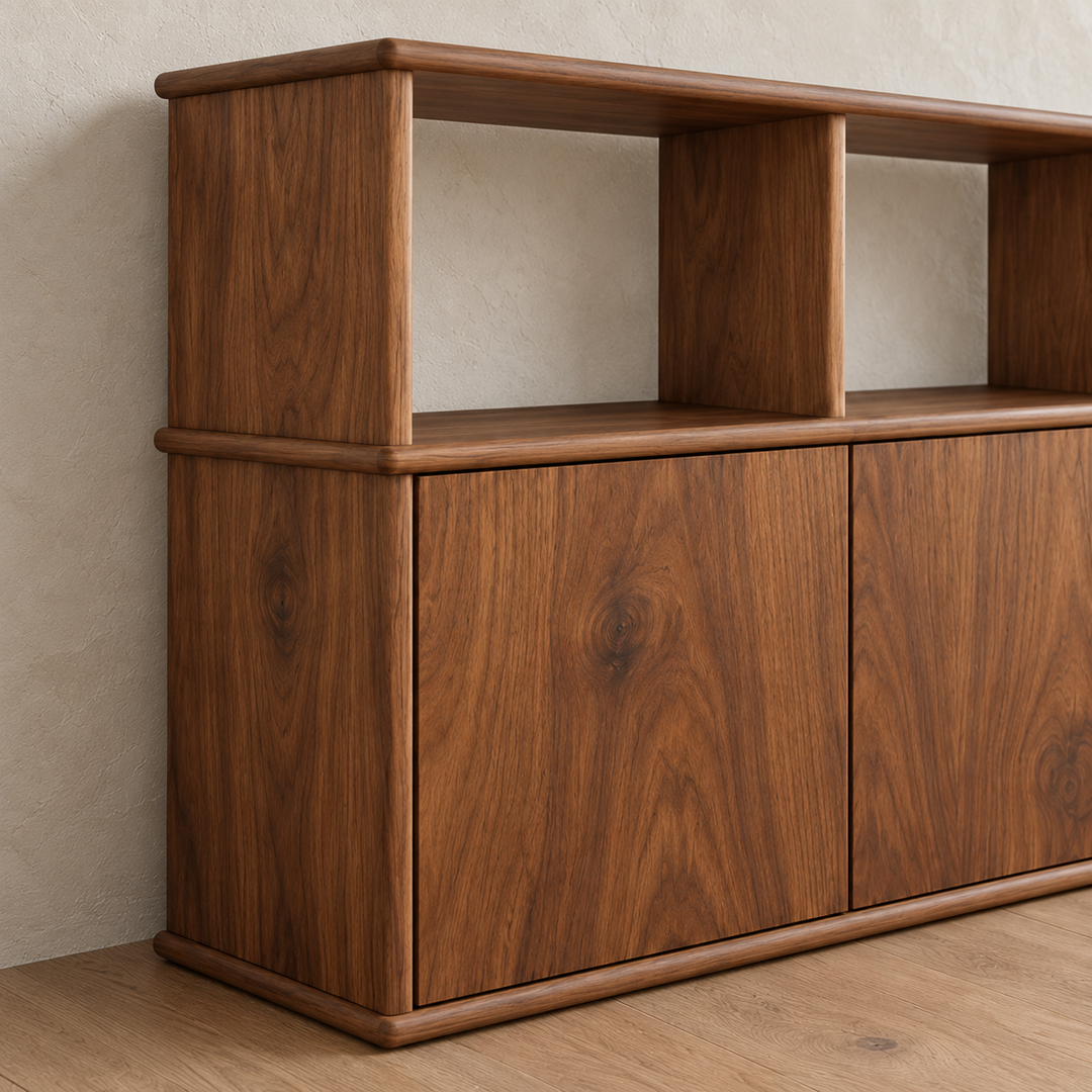 Close-up of a corner of the three door sideboard in walnut, showing the rounded edges of the top and middle shelf.