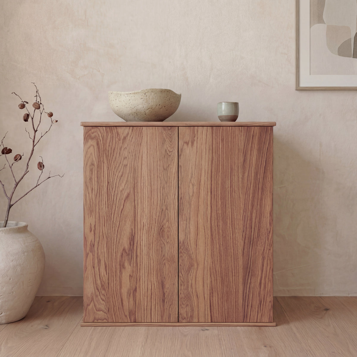 Two door cabinet in red oak — with decor