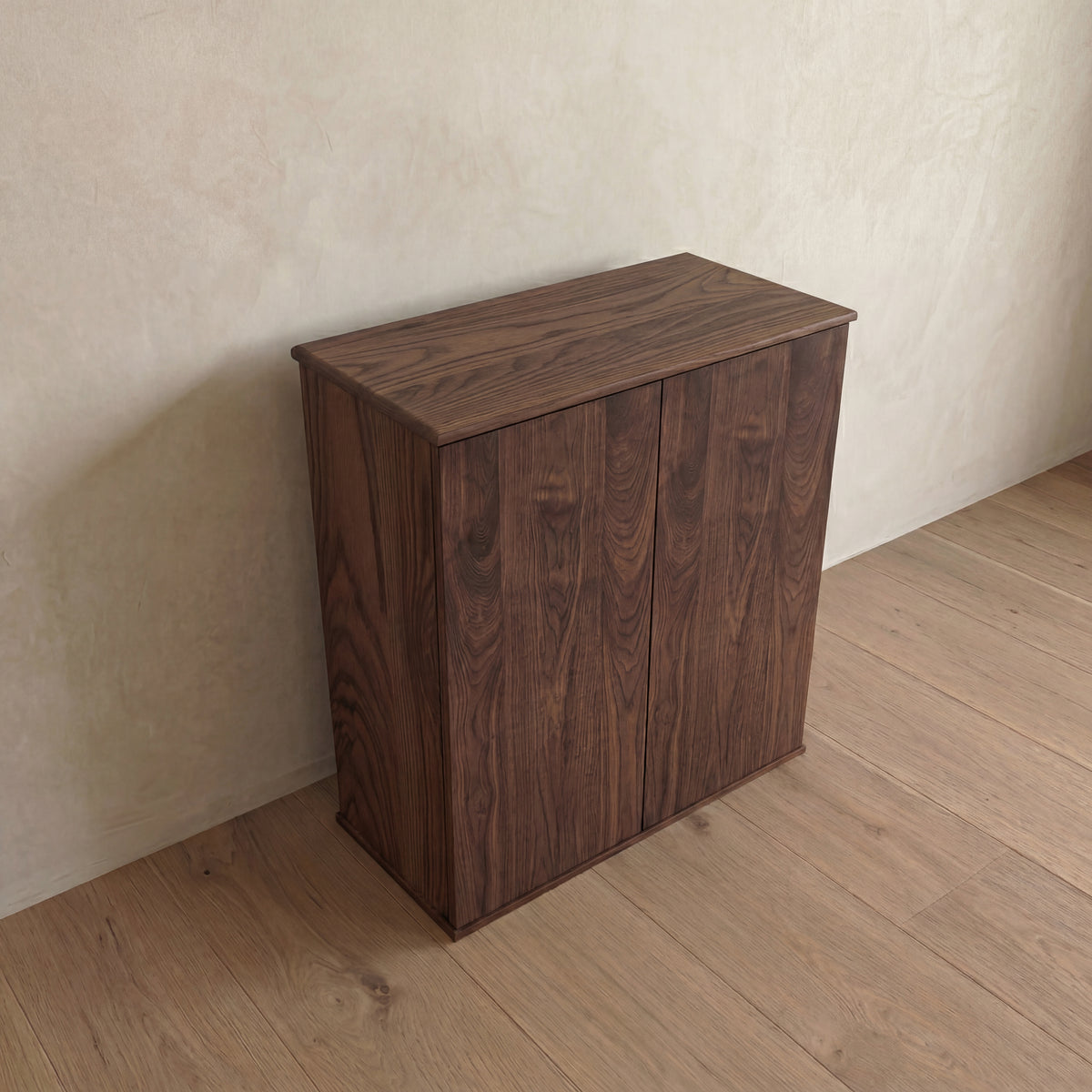 Two door cabinet in walnut — high angle