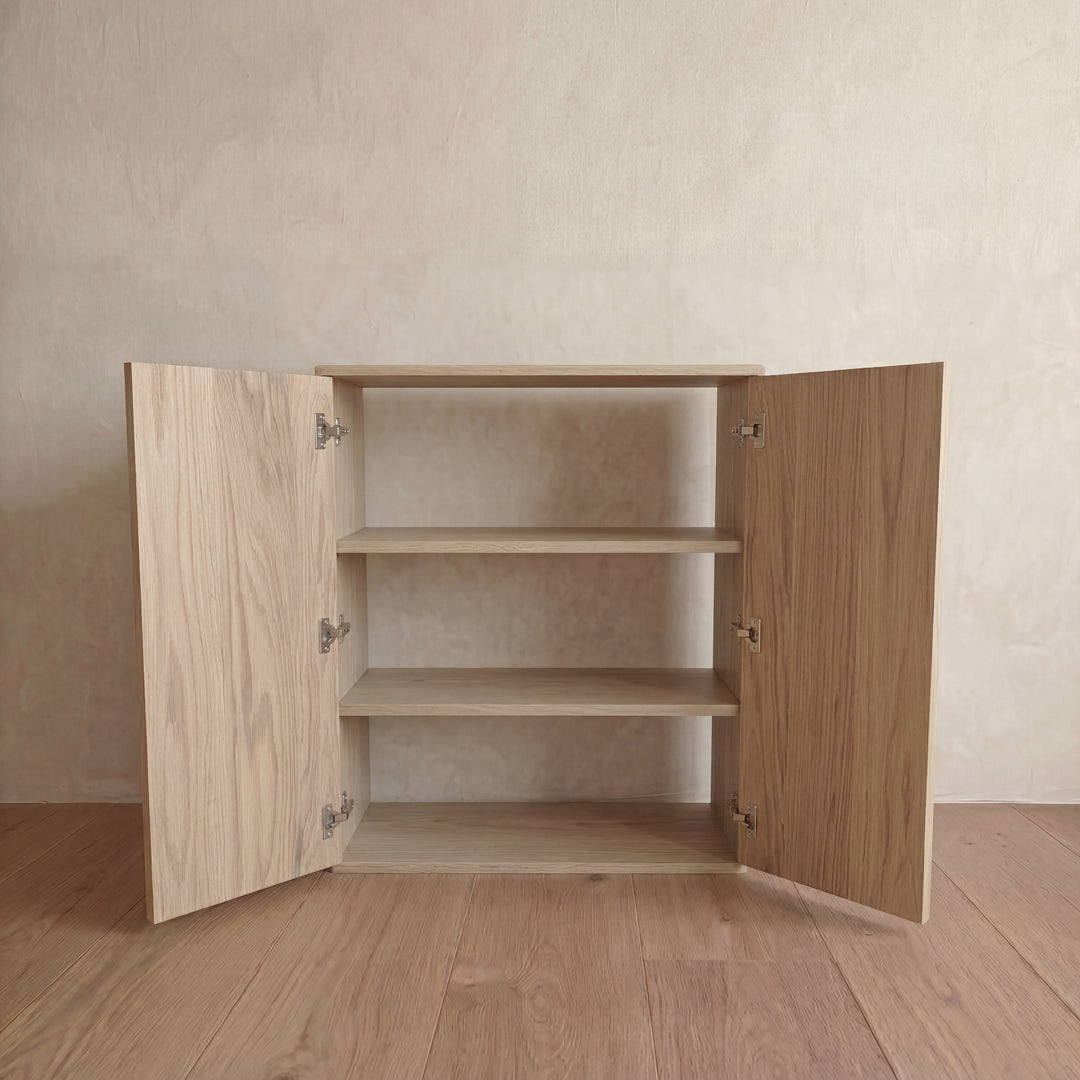 Two door cabinet in white oak — doors open